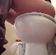 A girl takes a runny shit while sitting on a toilet in 2 different scenes. The first scene features a few audible plops over the wet, runny noise as well. No product shown. Presented in 720P HD. About 4 minutes.